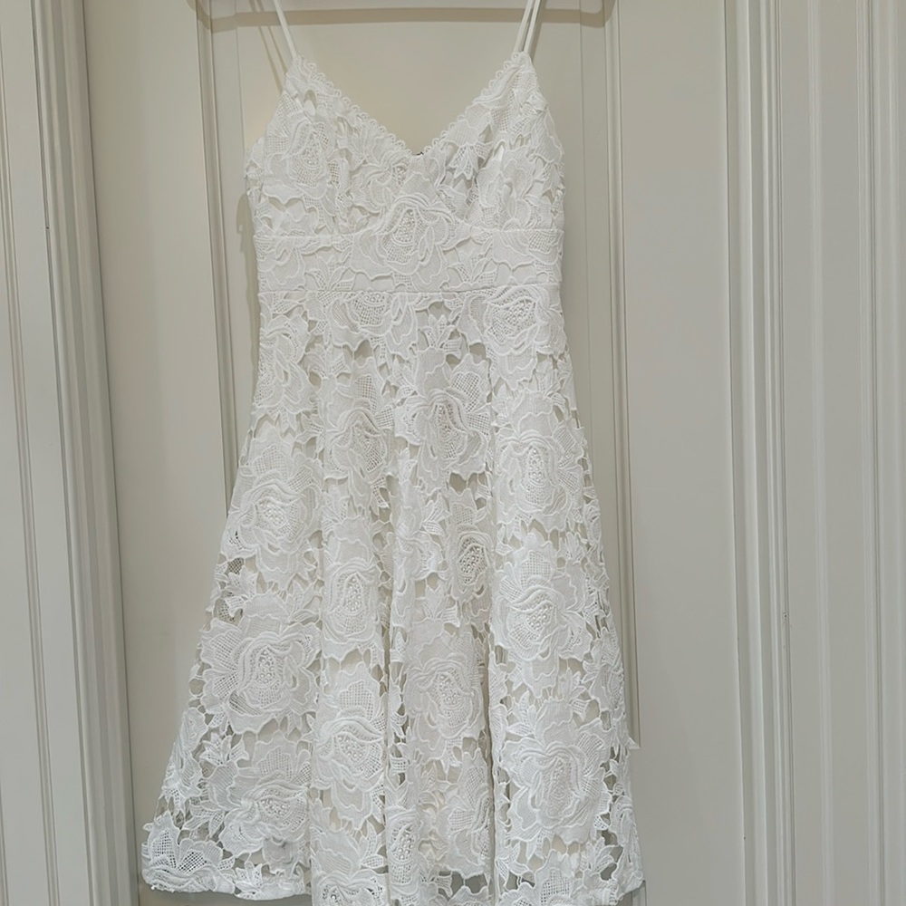 White, midi dress from Lulu’s. New with tags, never worn before.